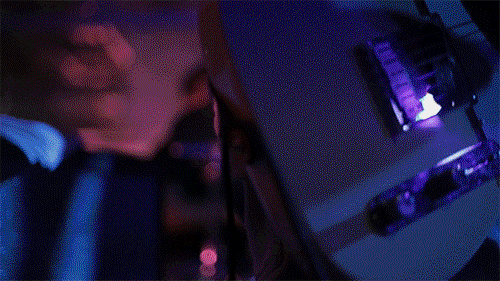 Musician playing electric guitar representing custom brand compositions.