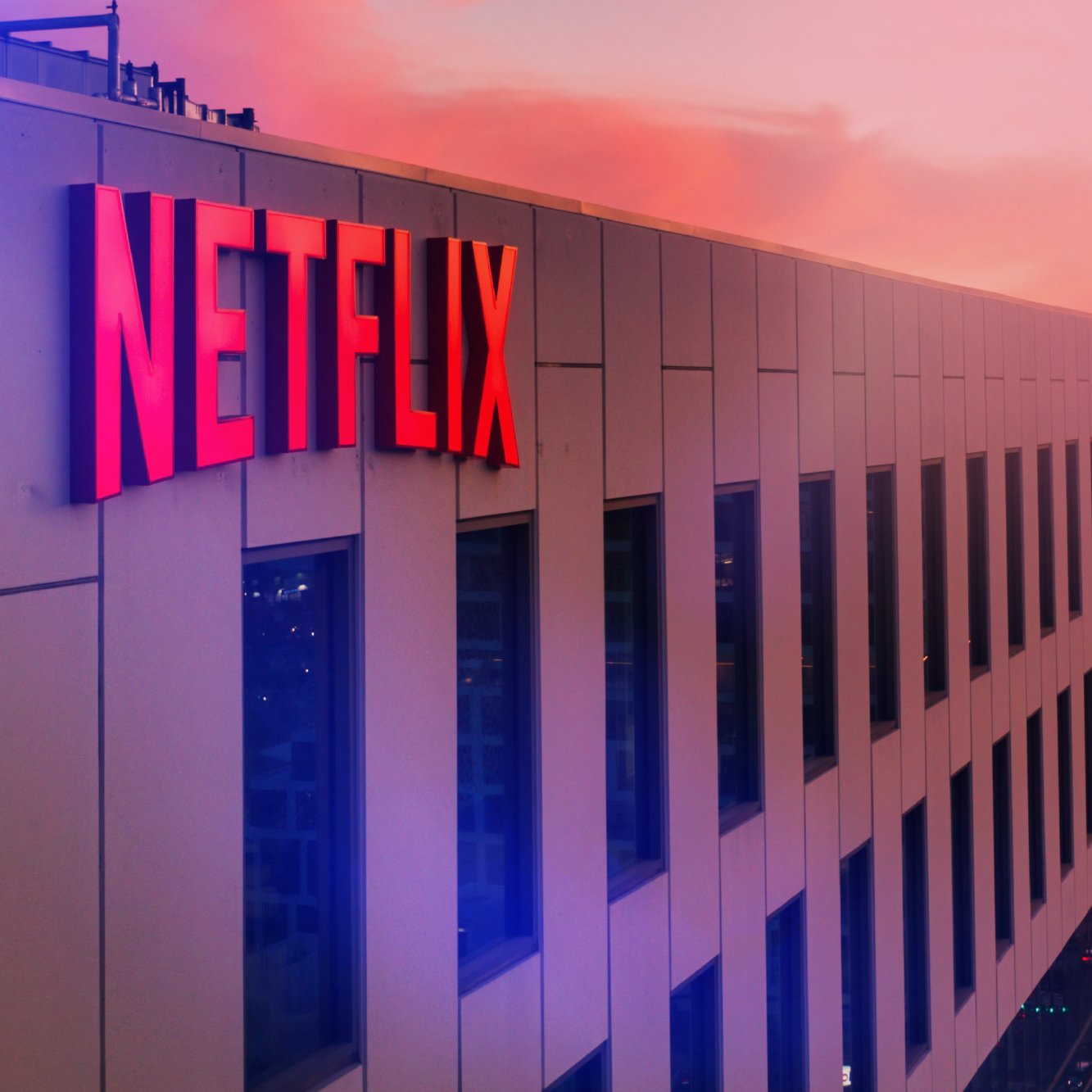 Netflix building at sunset representing iconic brand sound recognition.