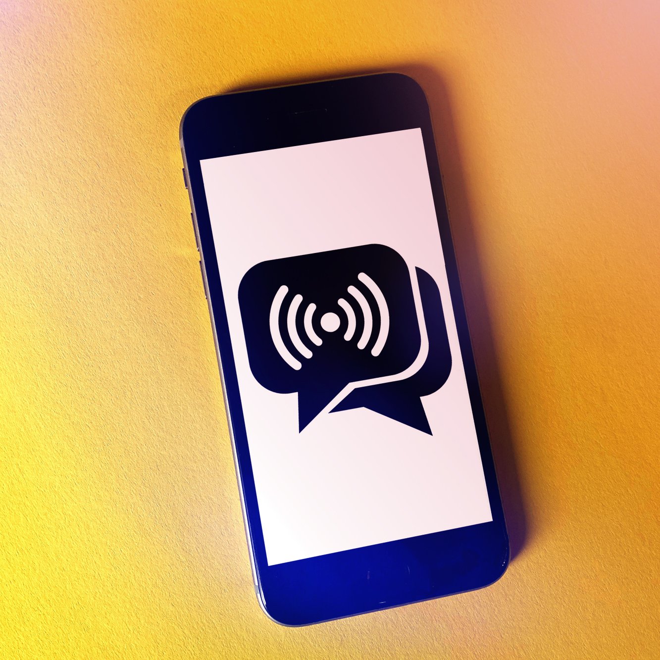 Smartphone displaying the iMessage app icon against a yellow background.