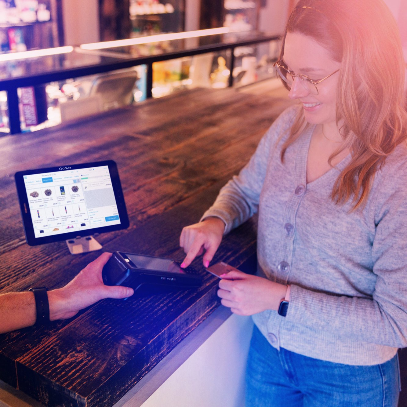Woman using laptop to represent audio logos across digital platforms.