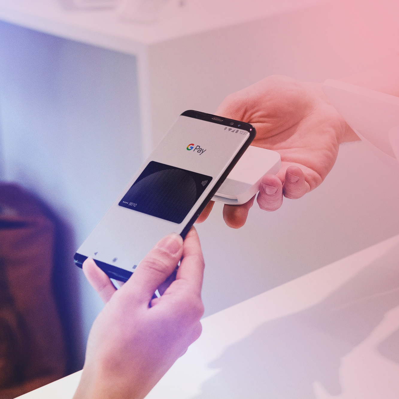 Person interacting with smartphone, illustrating audio brand engagement on digital touchpoints.